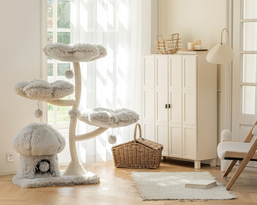 Stylish cat tree with fluffy, petal-shaped platforms and a cozy mushroom-shaped hideaway in a bright, minimalist living room with natural light.